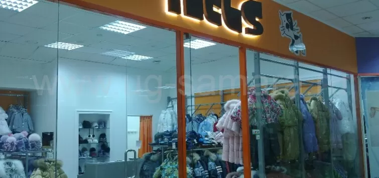 Вывеска магазина детской модной одежды «Nels»